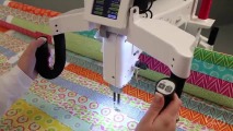 person quilting on a Babylock Crown Jewel III