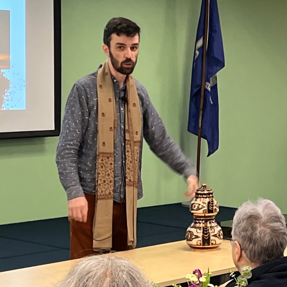 Presenter talking at the front of the room at the Turkish Coffee Event