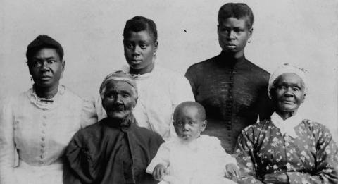 6 people sitting for a portrait