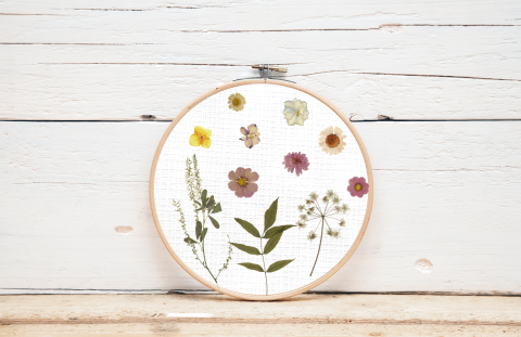 Dried flowers in an embroidery hoop