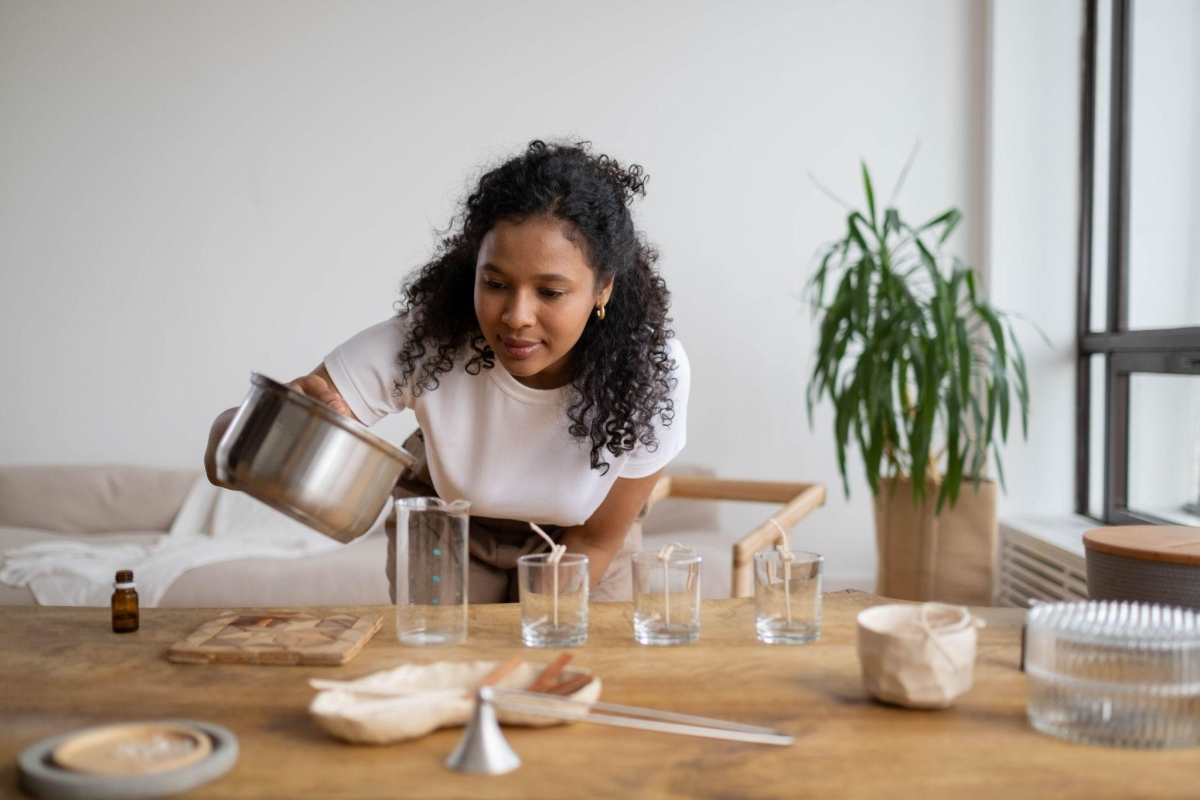 woman making candles