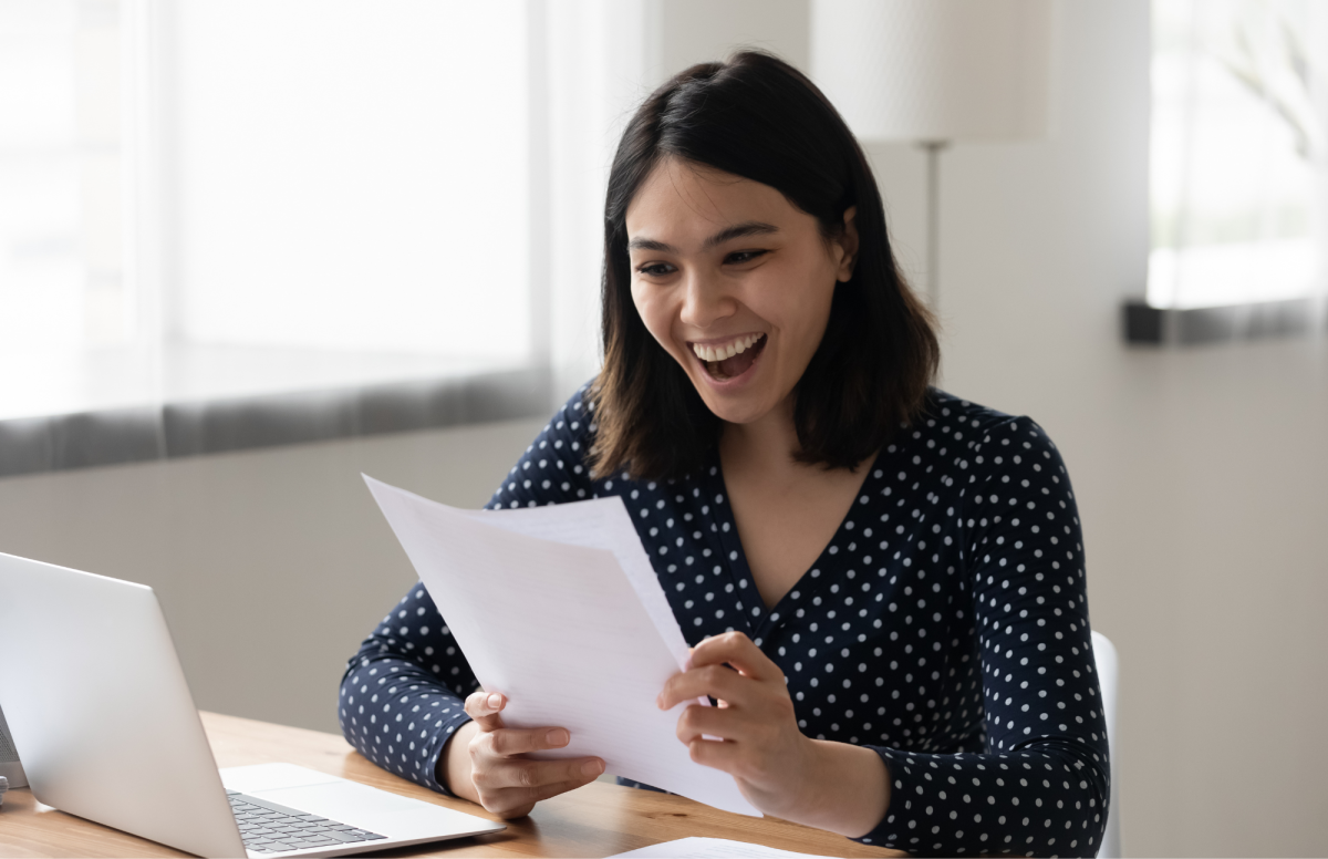 woman reading paper