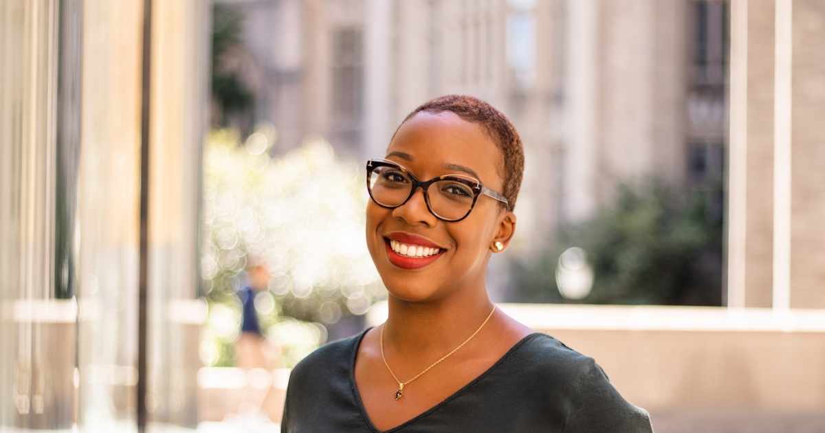 Woman in glasses smiling