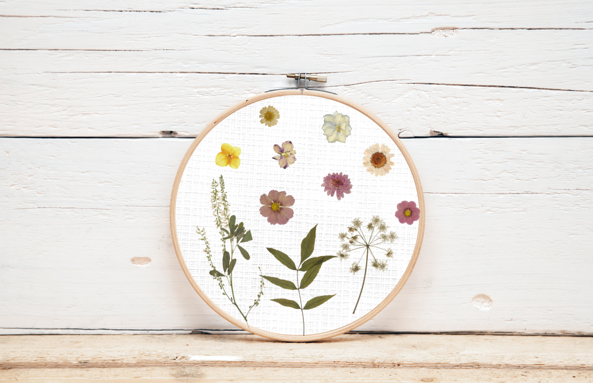 Dried flowers in an embroidery hoop