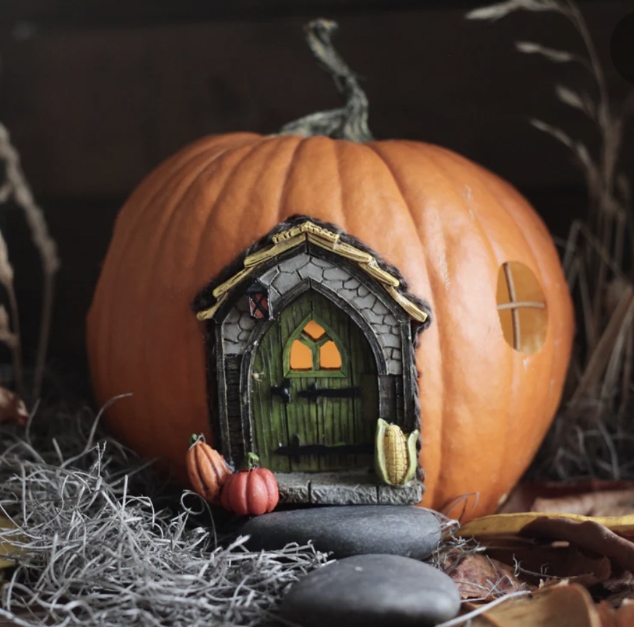 polymer clay pumpkin doorway inserted in a pumpkin